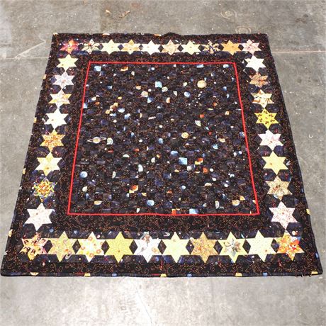 Homemade Quilt with Stars and Space Motif